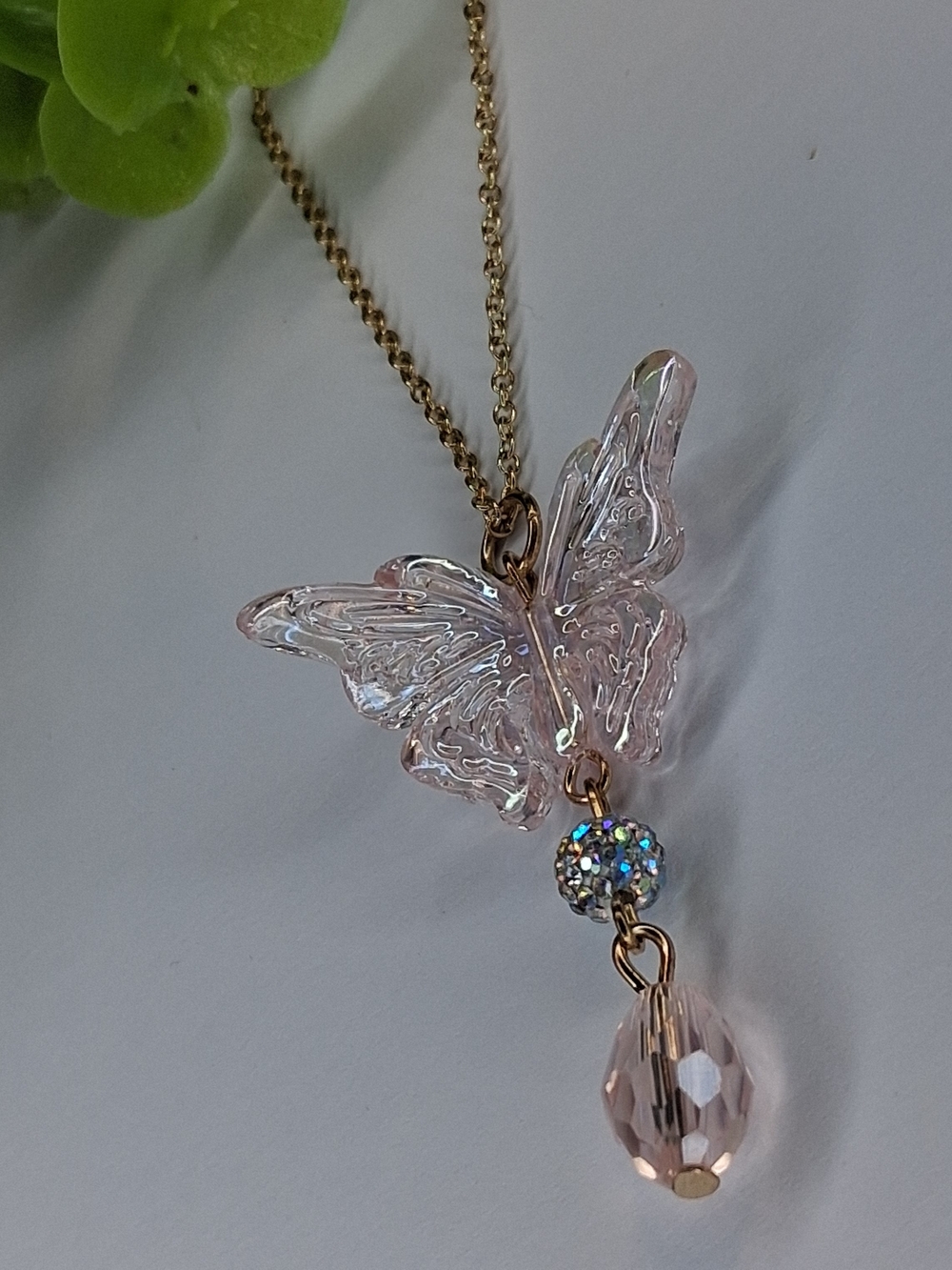 Delicate Pink Acrylic Butterfly Necklace With Iridescent Multicolored Bead